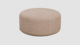 Beige ottoman on a light gray background