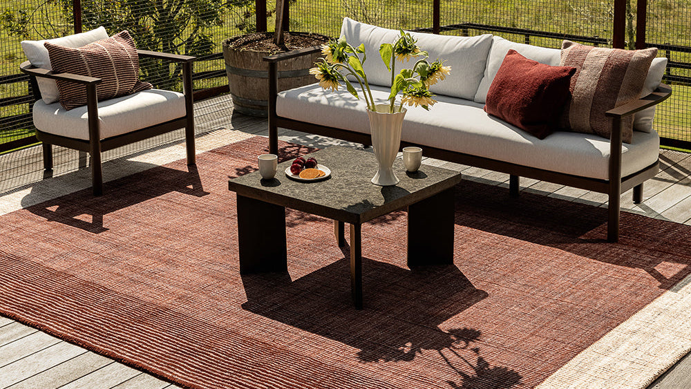 Bedrock Outdoor Rug — Claret styled setting, 160 x 230 cm to 300 x 400 cm