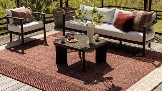 Bedrock Outdoor Rug — Claret styled setting, 160 x 230 cm to 300 x 400 cm