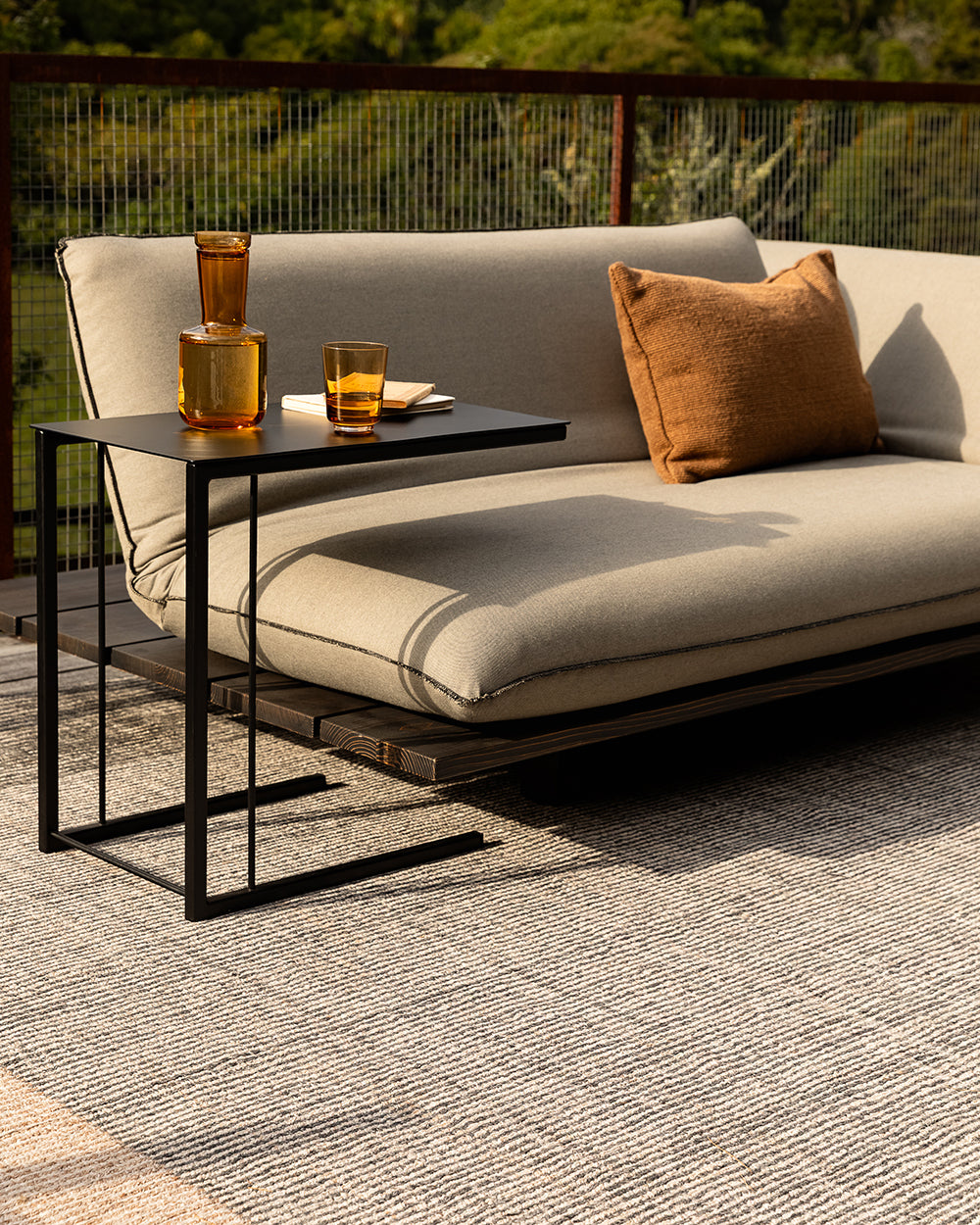 Bedrock Outdoor Rug — Zinc styled setting detail, 160 x 230 cm to 300 x 400 cm