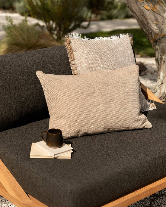 Clipper Outdoor Cushion — Almond cushion lifestyle image, 600 × 400 mm