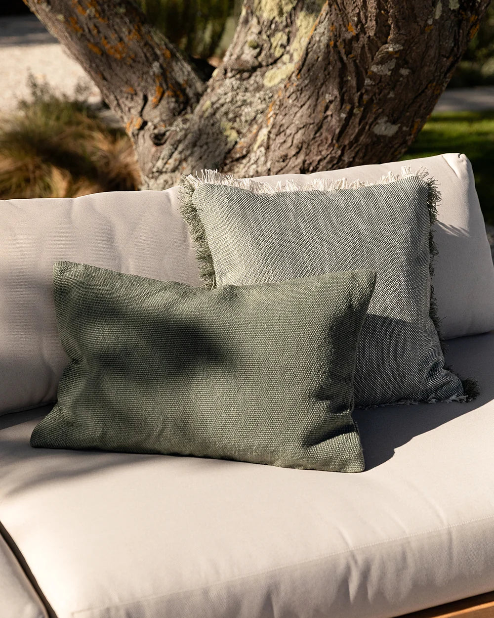 Clipper Outdoor Cushion — Eucalyptus cushion lifestyle image, 600 × 400 mm