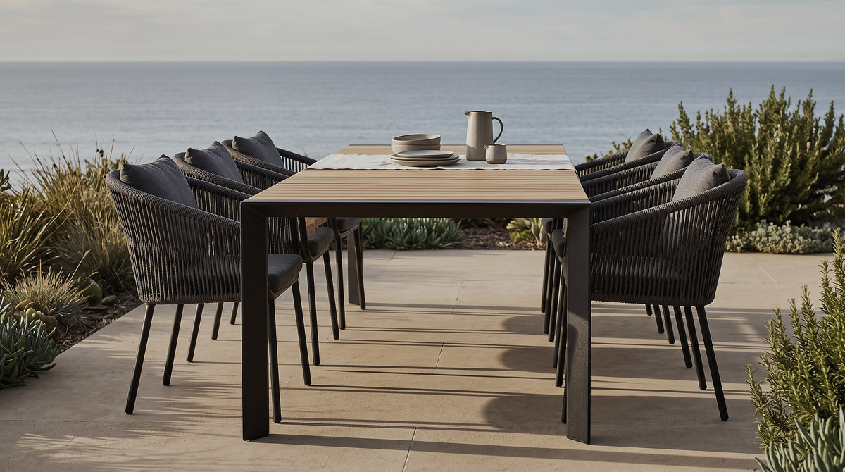 Avon extension table with Omaha rope dining chairs on a coastal terrace