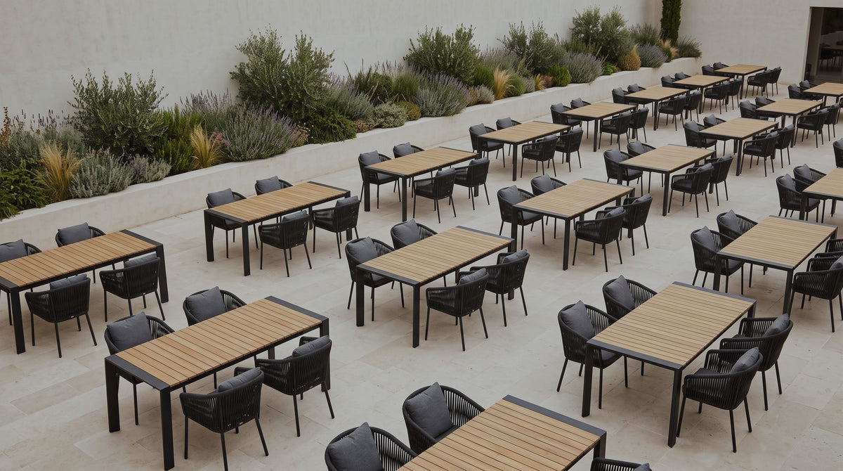 Restaurant courtyard with rows of Avon tables and Omaha chairs