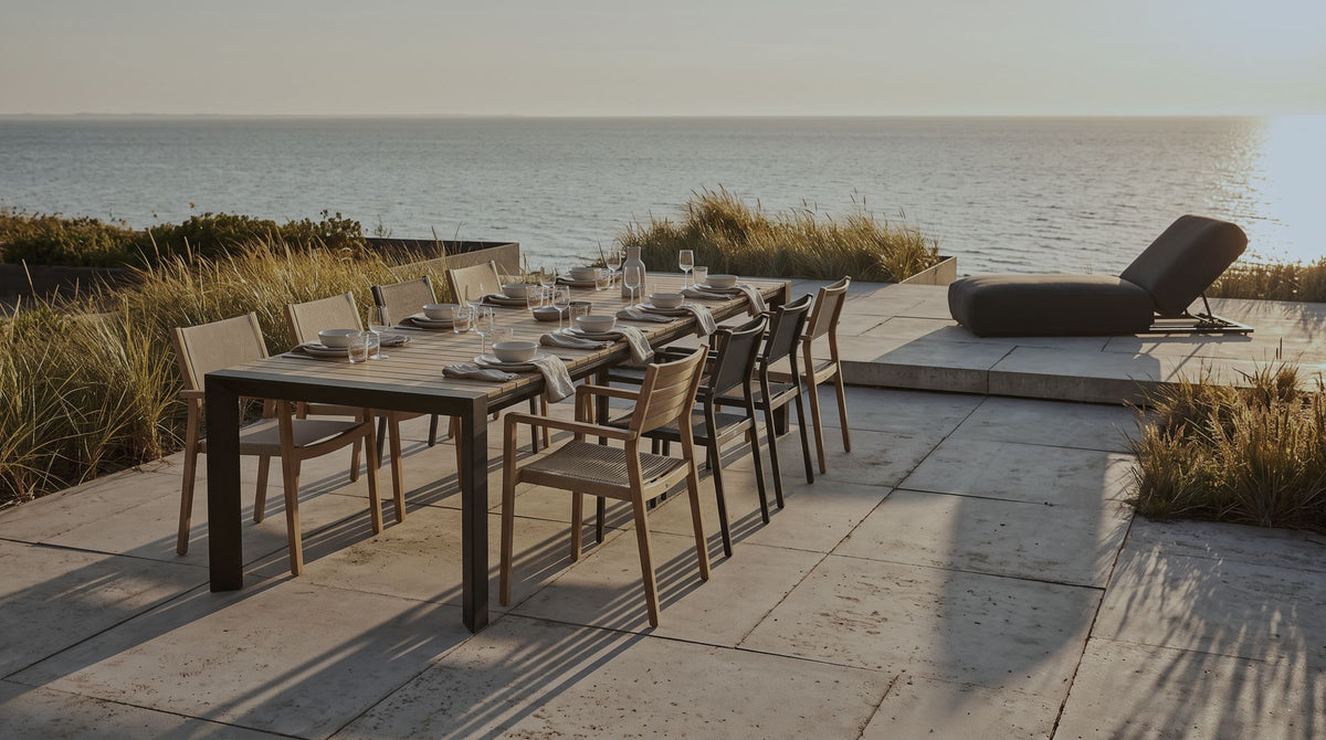 Avon table and Muriwai lounger in golden late-afternoon light