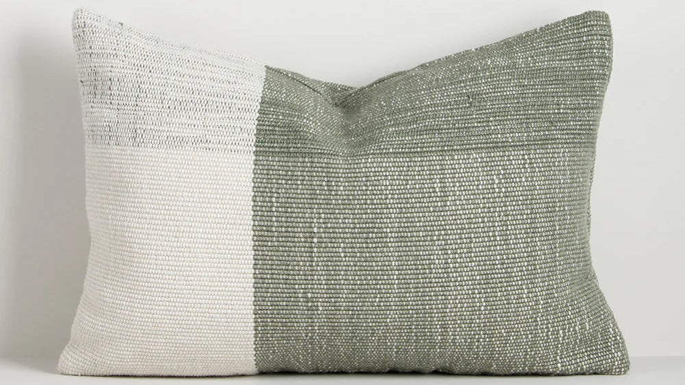 textured white and green outdoor cushion