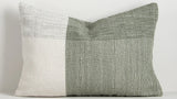 textured white and green outdoor cushion