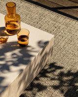 Ormond Outdoor Rug in Mineral styled in an outdoor living space