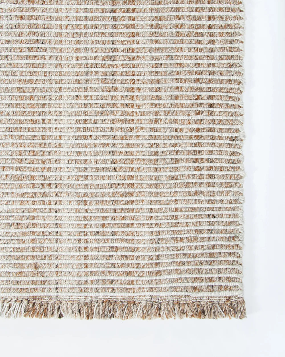 Rhodes Outdoor Floor Rug Teak handwoven corner and fringe detail