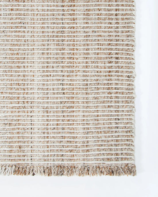 Rhodes Outdoor Floor Rug Teak handwoven corner and fringe detail