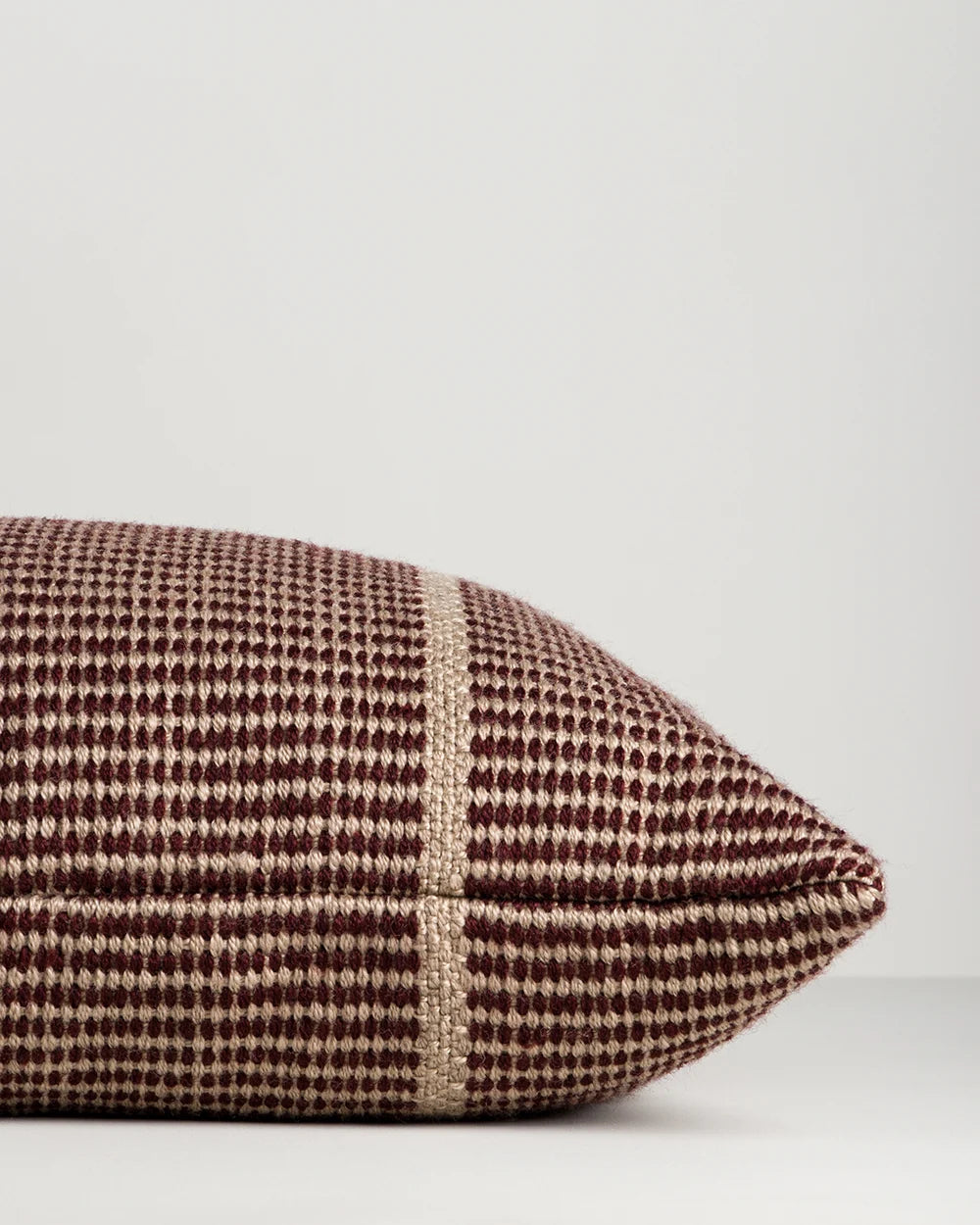 Shore Claret Outdoor Throw Cushion — handwoven edge detail, 400 × 600 mm