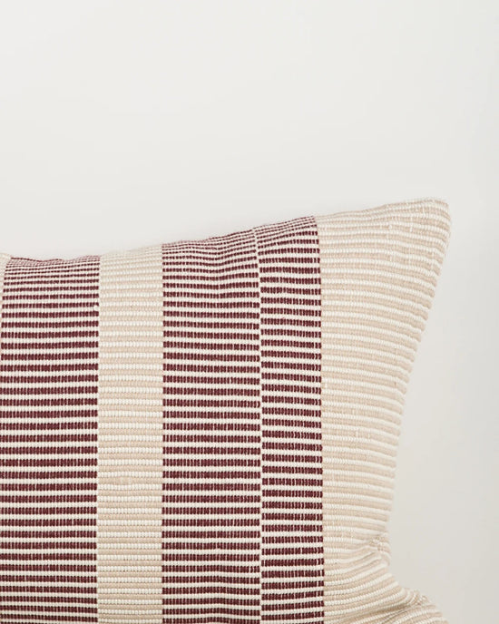 Solar Claret Outdoor Throw Cushion — woven pattern detail, 400 × 600 mm