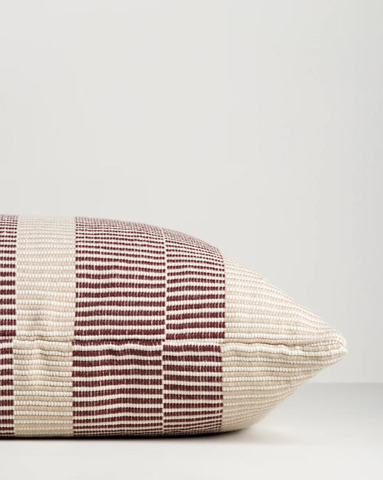 Solar Claret Outdoor Throw Cushion — handwoven edge detail, 400 × 600 mm